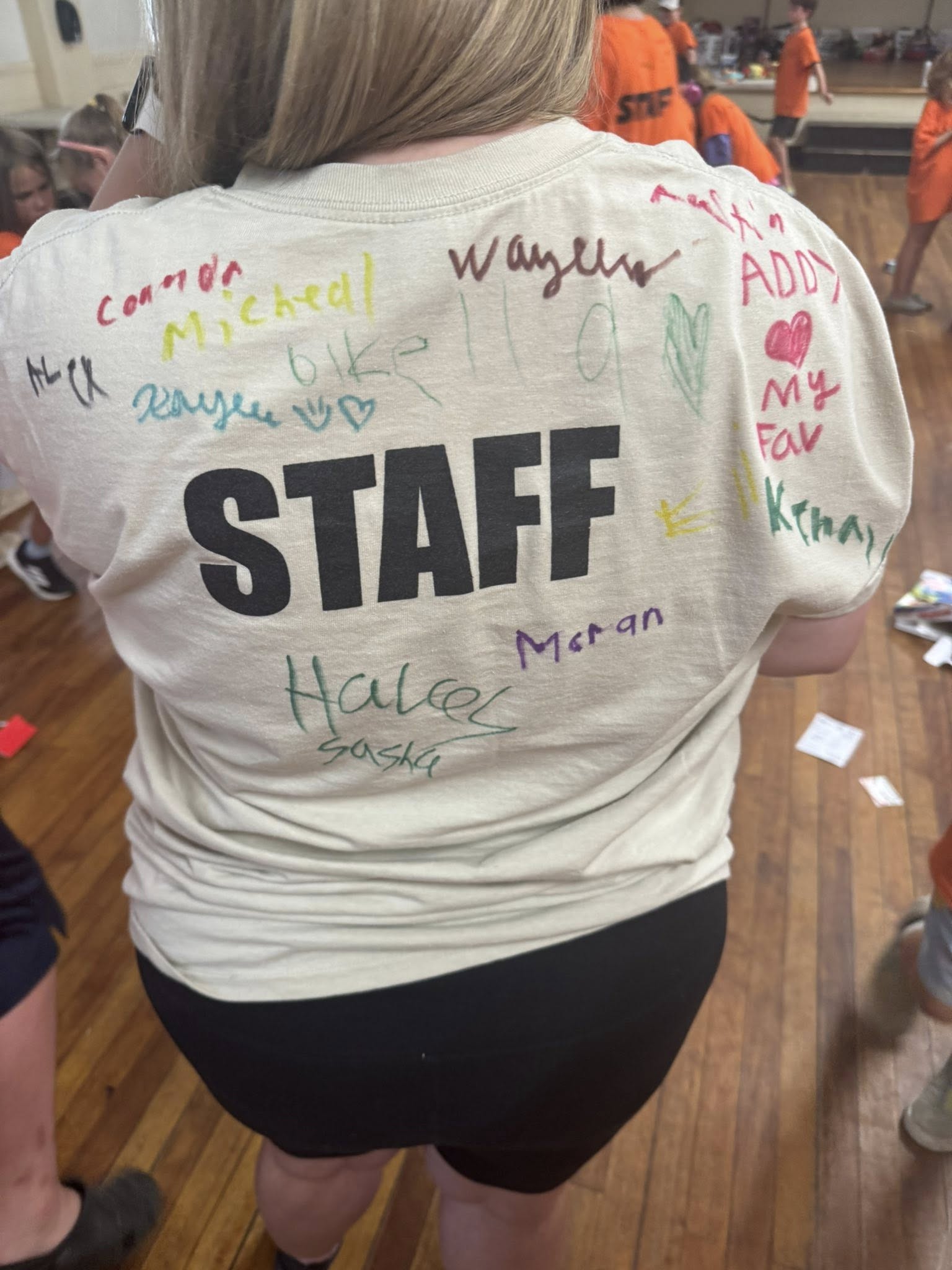 staff t-shirt signed by all the students