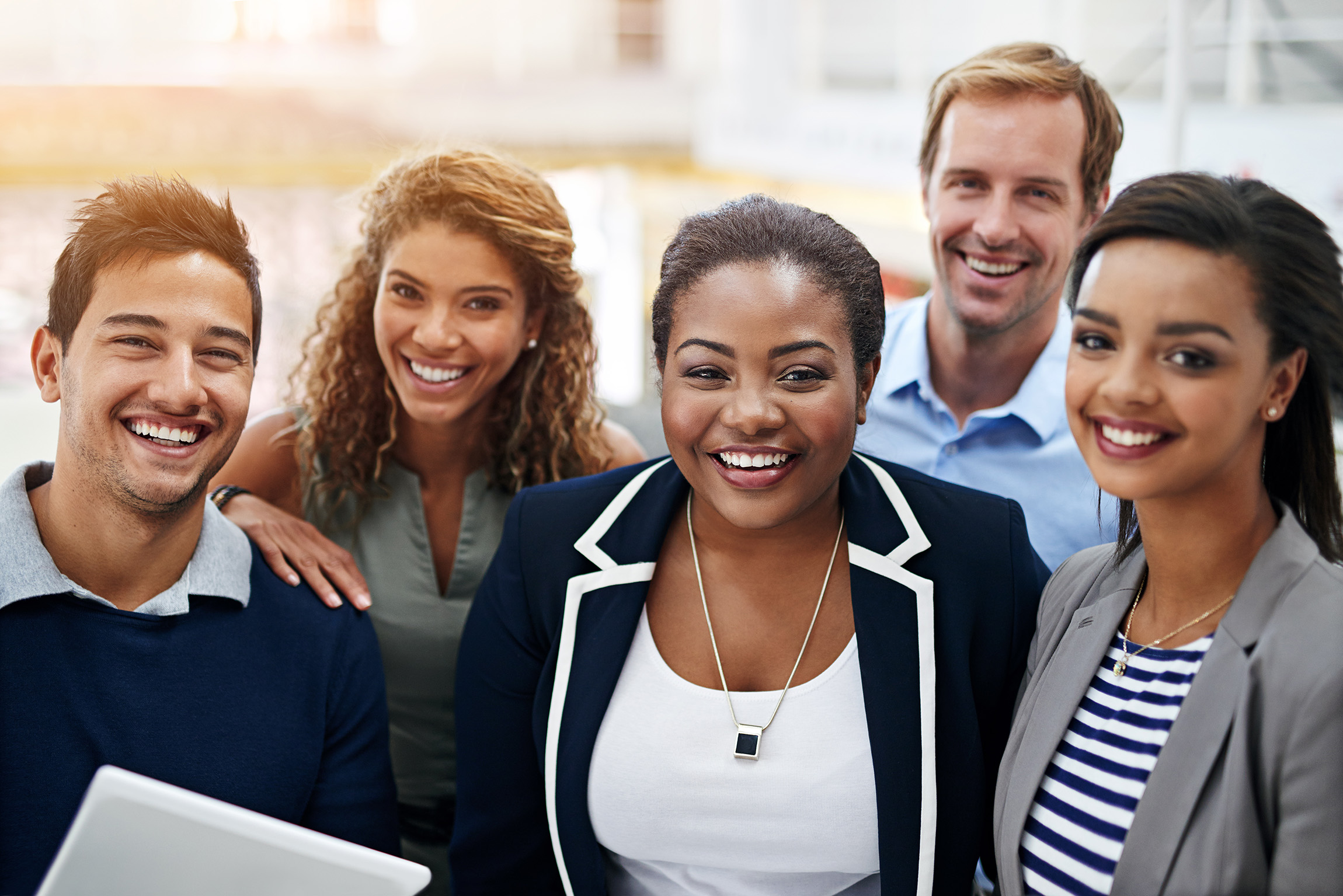 group of office workers smiling