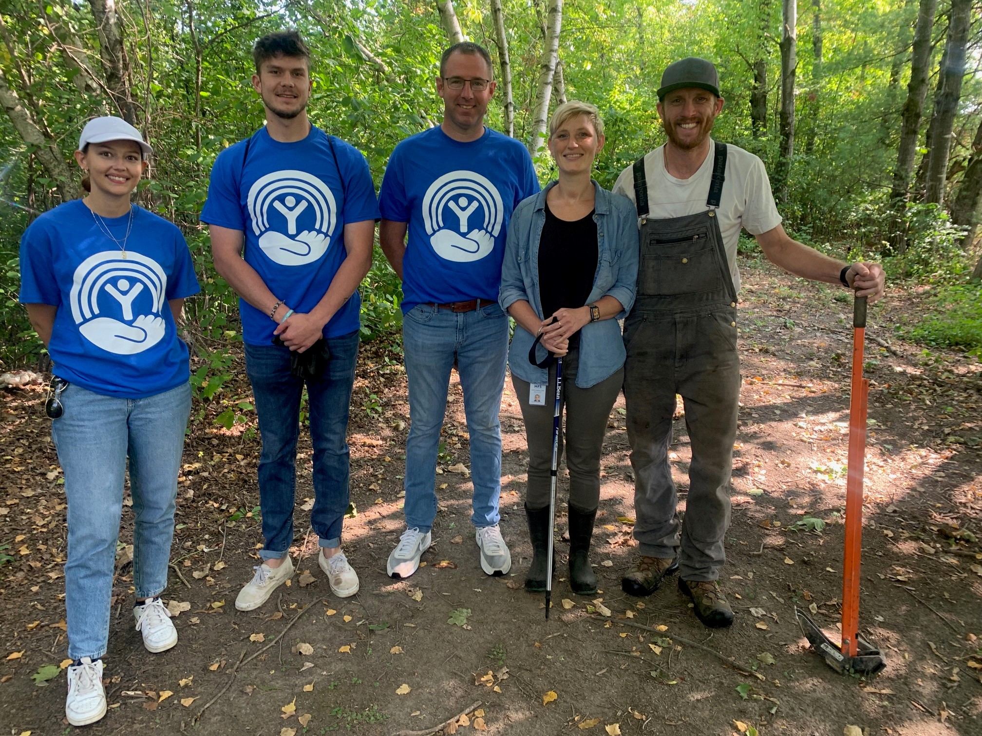 Day of Caring volunteers do some landscaping