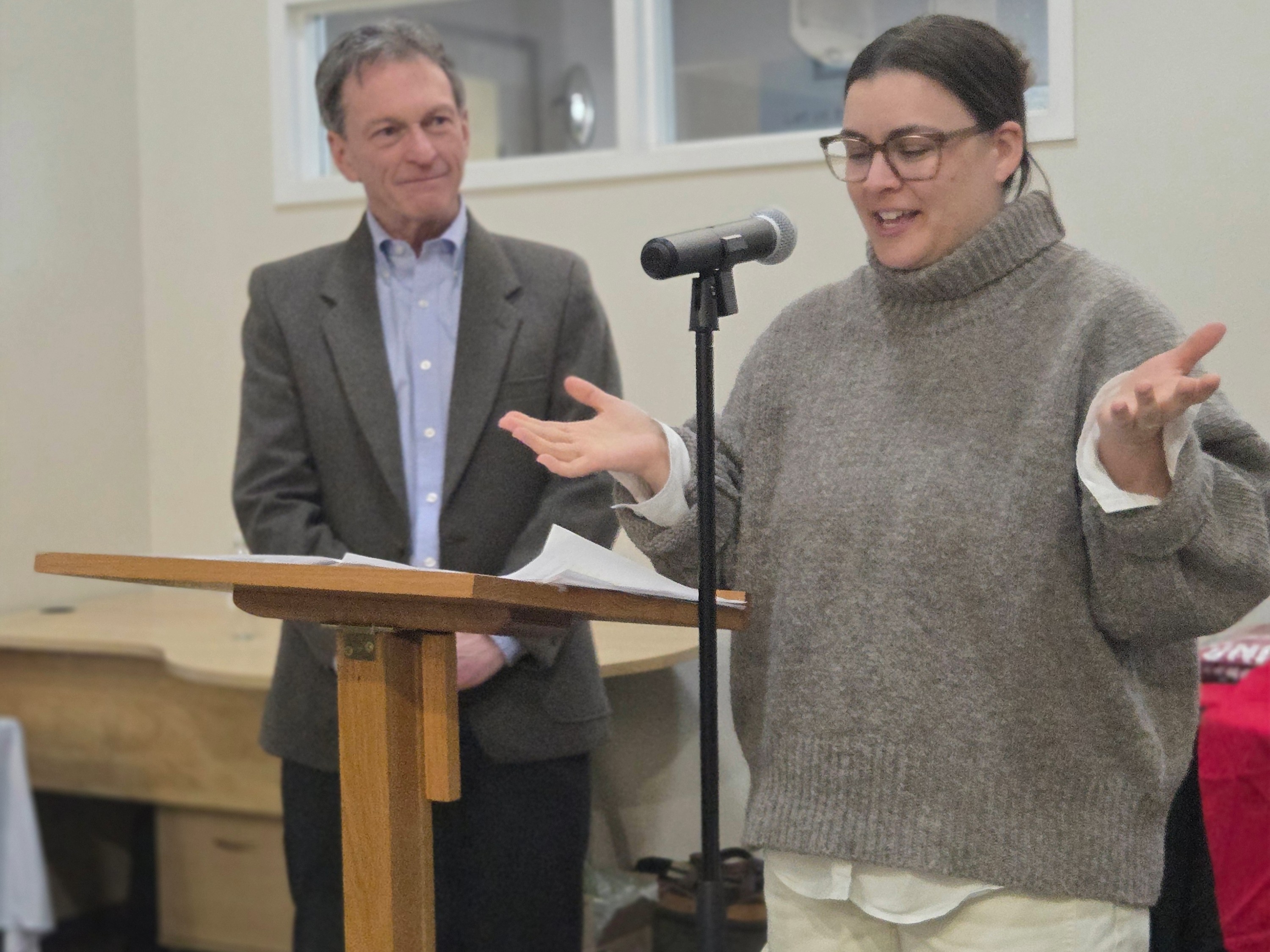 Tom Julius and Ashley Elliot speaking at the 2025 kickoff event