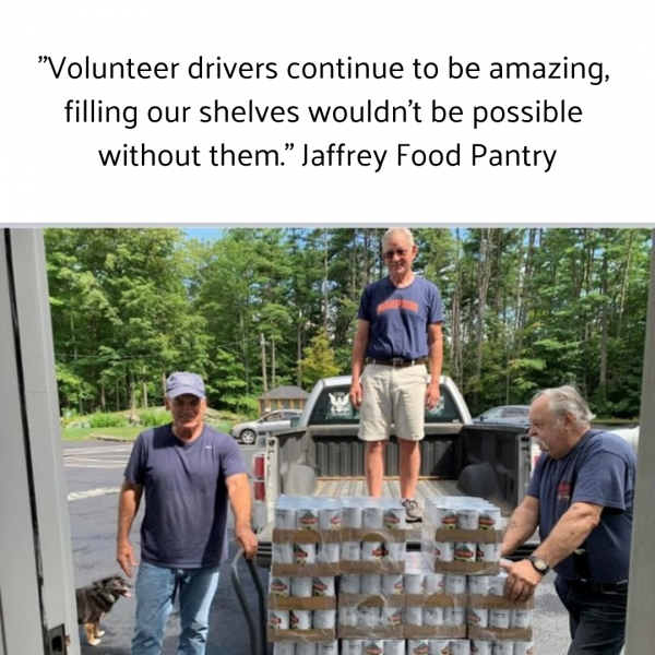 3 volunteers unloading a truck