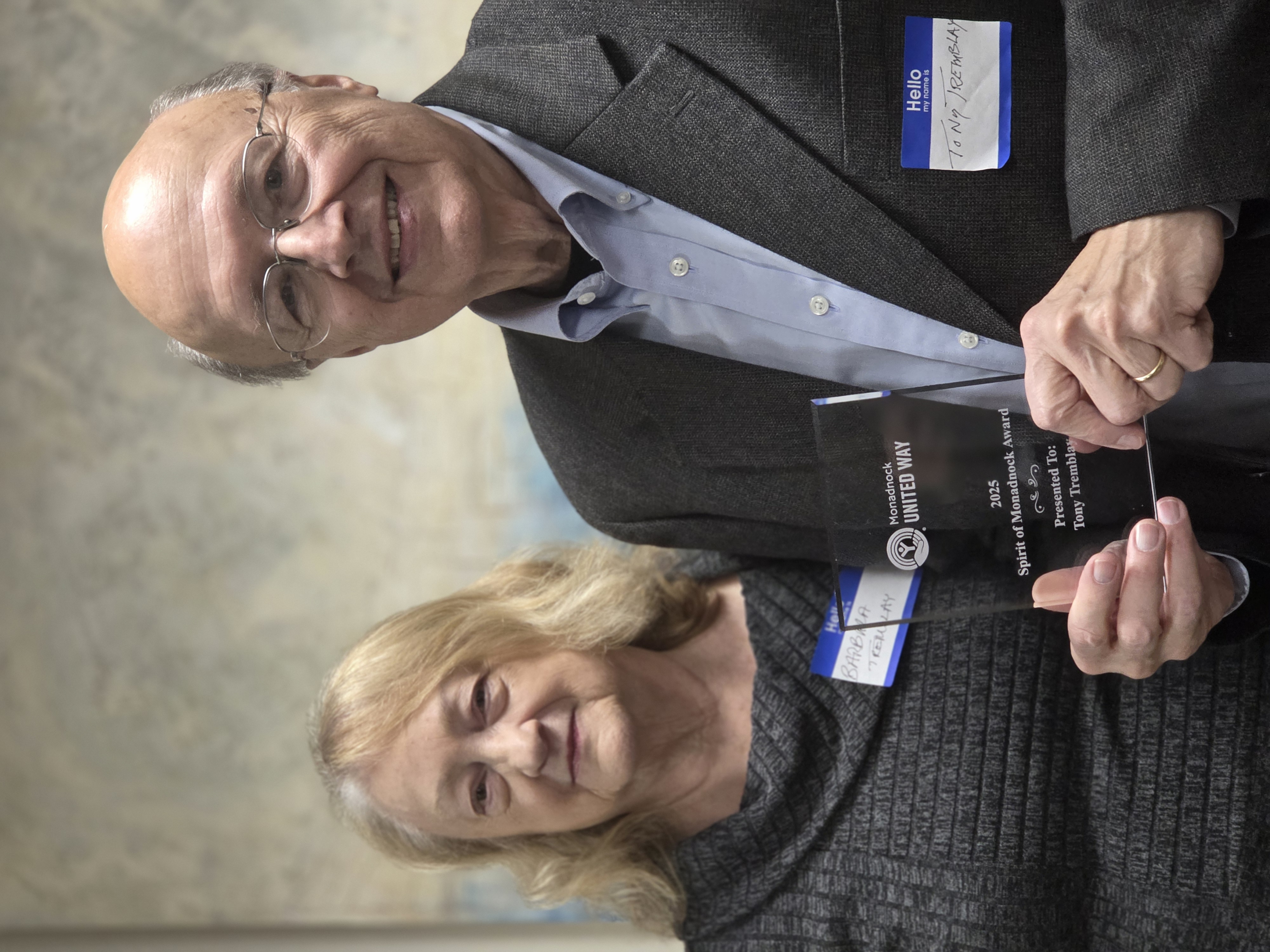 Tony Tremblay holding is award beside his wife, barbara