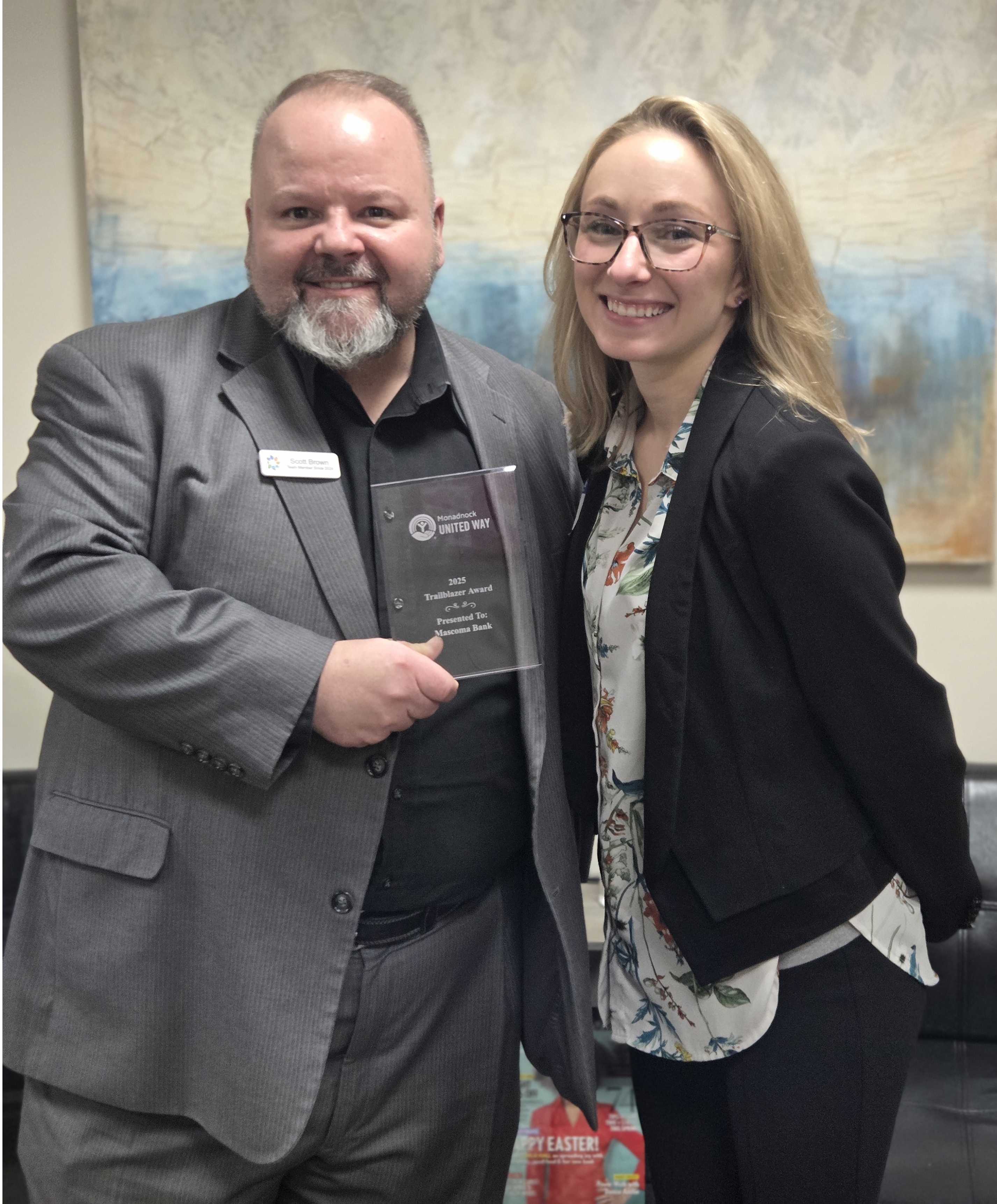 scott brown and caroline tolstoi with the trailblazer award