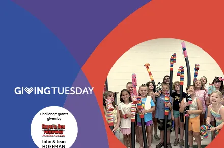 image of children with artwork celebrating GivingTuesday
