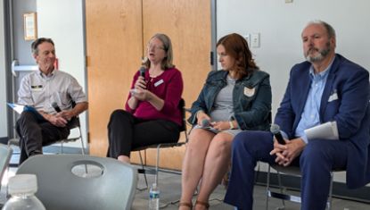two men and two women participating in a discussion panel