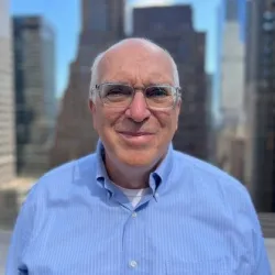 picture of Jock Wright with buildings in the background